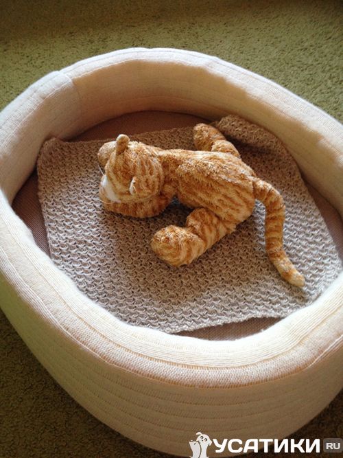 Cama para gato hecha de ropa de punto de lana